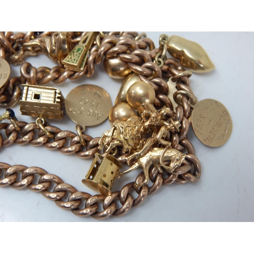 430 - 9ct Gold Charm Bracelet with Attached Charms: Weight 99.02g
