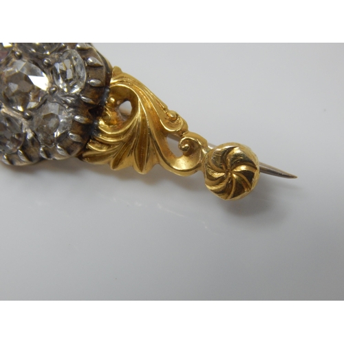 17 - Victorian Unmarked Gold Brooch Set with Seven Old Cut Diamonds Estimated @ 3.00cts Total: Width 48mm... 