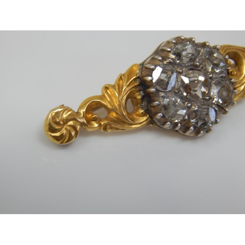 17 - Victorian Unmarked Gold Brooch Set with Seven Old Cut Diamonds Estimated @ 3.00cts Total: Width 48mm... 