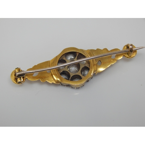 17 - Victorian Unmarked Gold Brooch Set with Seven Old Cut Diamonds Estimated @ 3.00cts Total: Width 48mm... 
