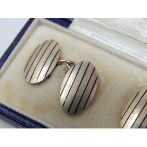 18 - A Pair of 9ct Gold Cufflinks: Weight 7.52g