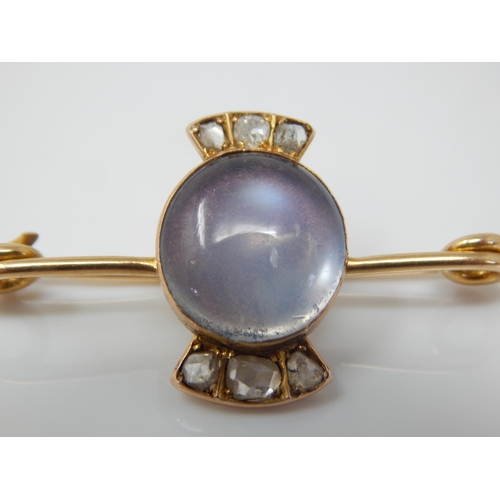 19 - Victorian Unmarked Gold Brooch Set with a central Moonstone 12mm x 10mm & Six Old Cut Diamonds: Widt... 