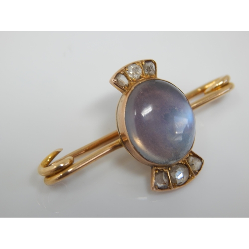19 - Victorian Unmarked Gold Brooch Set with a central Moonstone 12mm x 10mm & Six Old Cut Diamonds: Widt... 