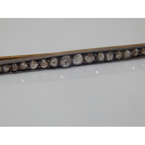 20 - Edwardian Unmarked Gold Diamond Brooch Set with  25 Old Cut Diamonds: Width 56mm: Weight 3.64g