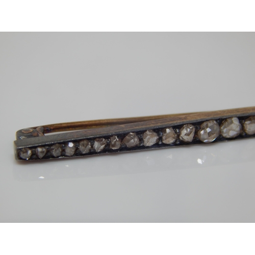 20 - Edwardian Unmarked Gold Diamond Brooch Set with  25 Old Cut Diamonds: Width 56mm: Weight 3.64g