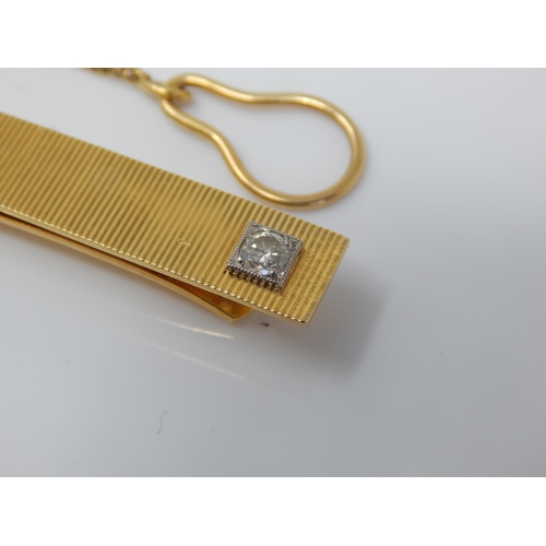 7 - An 18ct Gold Diamond Set Tie Slide: Width 6cm: Weight 11.57g