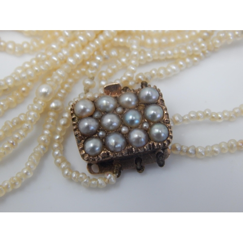 35 - Victorian 15ct Gold Clasped Four String Natural Freshwater Pearl Necklace: Length 55cm. One String n... 