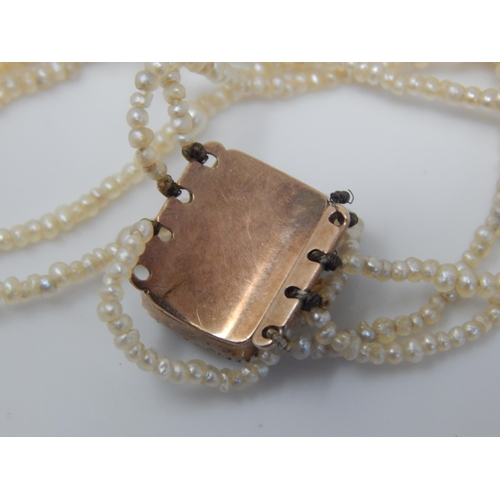35 - Victorian 15ct Gold Clasped Four String Natural Freshwater Pearl Necklace: Length 55cm. One String n... 
