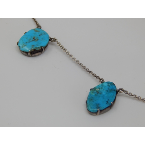 39 - Edwardian Rose Gold Turquoise Set Ring Size F together with an Edwardian Silver Necklace with Five T... 