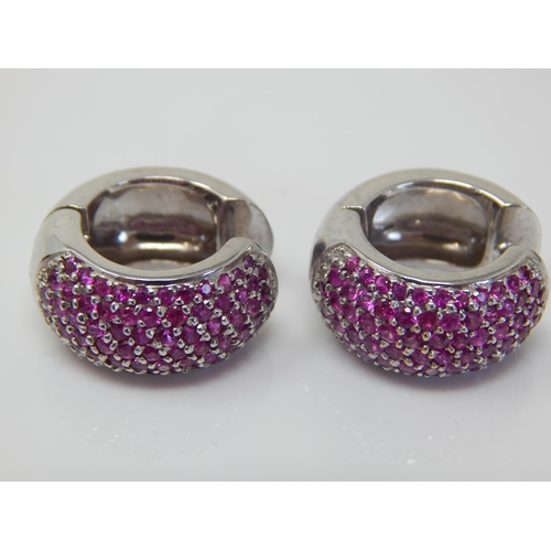 77 - A Pair of Heavy 18ct White Gold Earrings Set with Natural Rubies: Weight 20.58g Complete with Origin... 