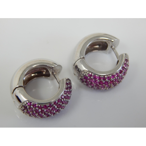 77 - A Pair of Heavy 18ct White Gold Earrings Set with Natural Rubies: Weight 20.58g Complete with Origin... 