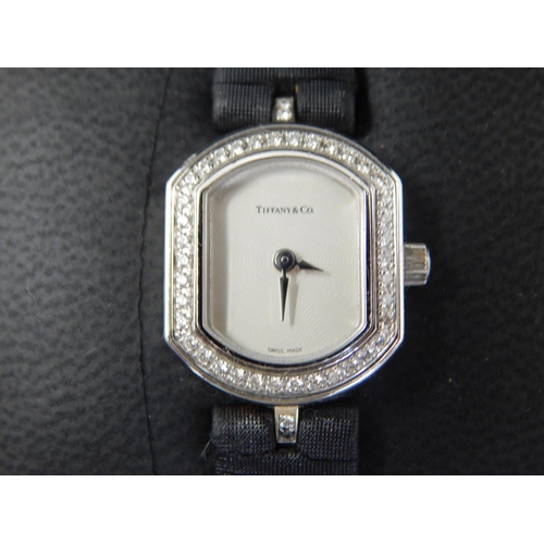 81 - TIFFANY & CO: 18ct White Gold Ladies Wristwatch Set with 42 Round Brilliant Cut Diamonds: VS Clarity... 