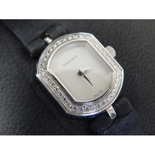 81 - TIFFANY & CO: 18ct White Gold Ladies Wristwatch Set with 42 Round Brilliant Cut Diamonds: VS Clarity...