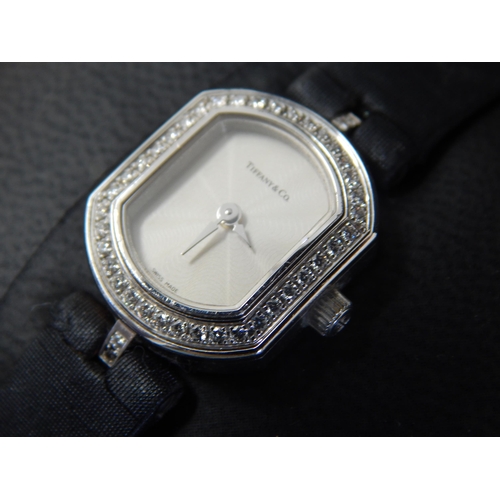 81 - TIFFANY & CO: 18ct White Gold Ladies Wristwatch Set with 42 Round Brilliant Cut Diamonds: VS Clarity... 