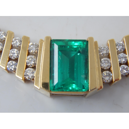 92 - An 18ct Gold Colombian Emerald & Diamond Necklace Set with a 7.00ct Cut Cornered Octagonal Step Cut ... 