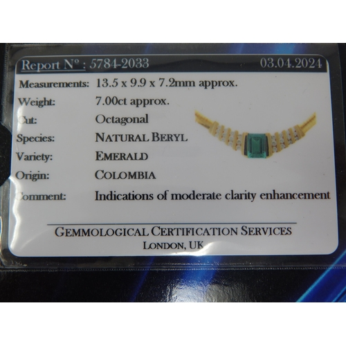 92 - An 18ct Gold Colombian Emerald & Diamond Necklace Set with a 7.00ct Cut Cornered Octagonal Step Cut ... 