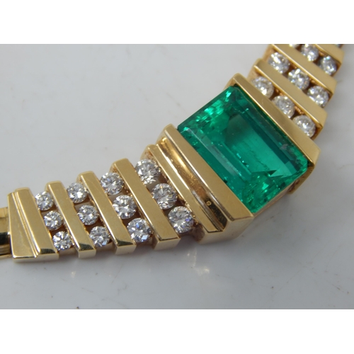 92 - An 18ct Gold Colombian Emerald & Diamond Necklace Set with a 7.00ct Cut Cornered Octagonal Step Cut ... 
