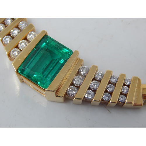 92 - An 18ct Gold Colombian Emerald & Diamond Necklace Set with a 7.00ct Cut Cornered Octagonal Step Cut ... 