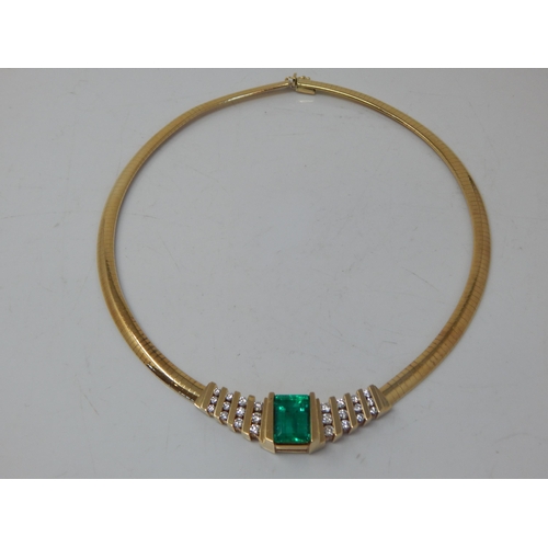 92 - An 18ct Gold Colombian Emerald & Diamond Necklace Set with a 7.00ct Cut Cornered Octagonal Step Cut ... 