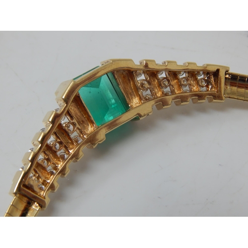 92 - An 18ct Gold Colombian Emerald & Diamond Necklace Set with a 7.00ct Cut Cornered Octagonal Step Cut ... 