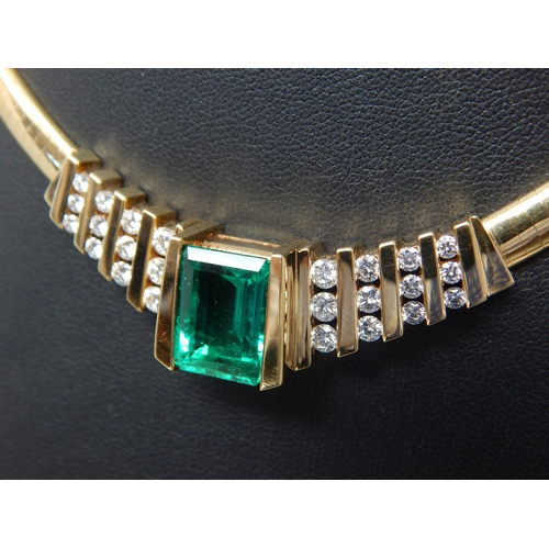 92 - An 18ct Gold Colombian Emerald & Diamond Necklace Set with a 7.00ct Cut Cornered Octagonal Step Cut ... 