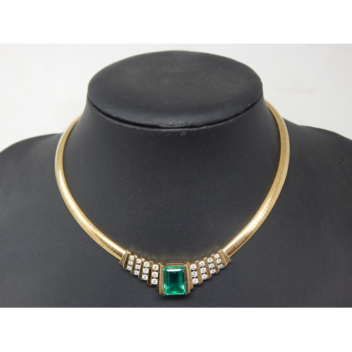 92 - An 18ct Gold Colombian Emerald & Diamond Necklace Set with a 7.00ct Cut Cornered Octagonal Step Cut ... 