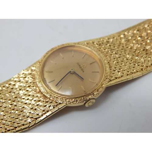 93 - OMEGA 18ct Gold Ladies Wristwatch on 18ct Gold Bracelet with Adjustable Length Strap: Hallmarked Lon...