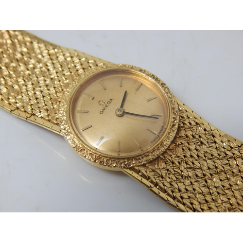 93 - OMEGA 18ct Gold Ladies Wristwatch on 18ct Gold Bracelet with Adjustable Length Strap: Hallmarked Lon... 