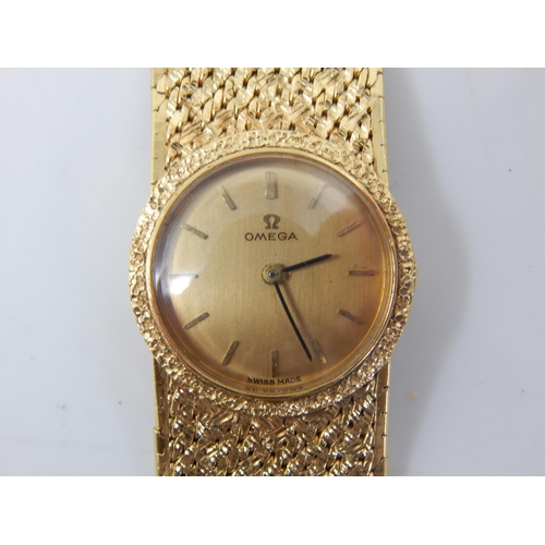 93 - OMEGA 18ct Gold Ladies Wristwatch on 18ct Gold Bracelet with Adjustable Length Strap: Hallmarked Lon... 