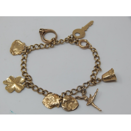 9ct Gold Charm Bracelet with Numerous Charms: Length 18.5cm: Weight 12.64g