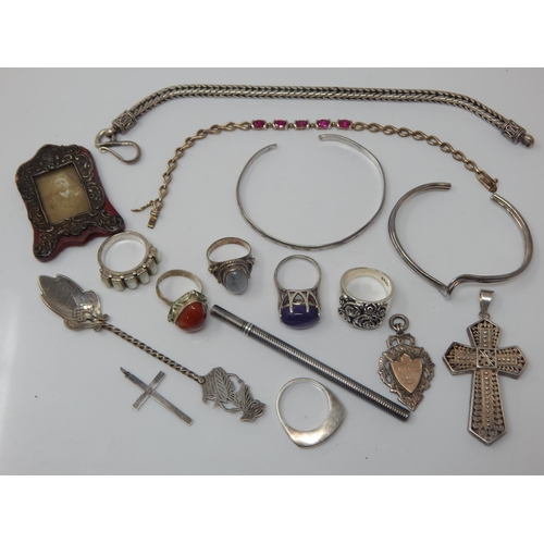120 - A Quantity of Silver Jewellery Including Bangles, Pendant, Rings etc (lot) Weight 148g