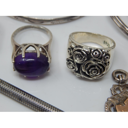120 - A Quantity of Silver Jewellery Including Bangles, Pendant, Rings etc (lot) Weight 148g
