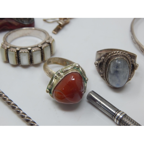 120 - A Quantity of Silver Jewellery Including Bangles, Pendant, Rings etc (lot) Weight 148g