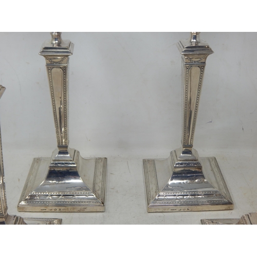 128 - A Good Set of Four 18th Century George III Silver Candlesticks with Original Hallmarked Removeable S... 