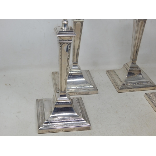 128 - A Good Set of Four 18th Century George III Silver Candlesticks with Original Hallmarked Removeable S... 
