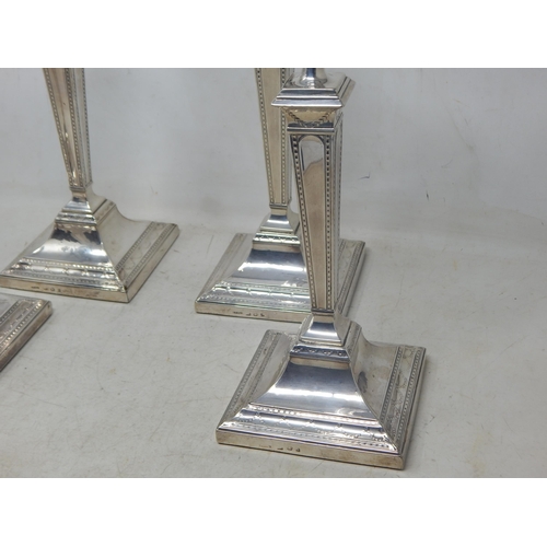 128 - A Good Set of Four 18th Century George III Silver Candlesticks with Original Hallmarked Removeable S... 