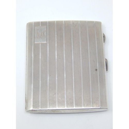 145 - Silver Cigarette Case: Hallmarked Chester 1927 by Turner & Simpson: Measures 8.5cm x 7.0cm: Weight 9... 