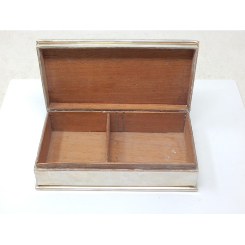 148 - Silver Cigarette Box with Cedar Lined Interior: Hallmarked Birmingham 1949 (Rubbed) Measuring 17cm w... 