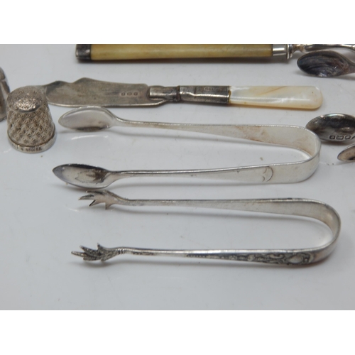 161 - A Quantity of Hallmarked Silver Including Sugar Tongs, Pickle Forks, Butter Knife & Thimble: Gross w... 
