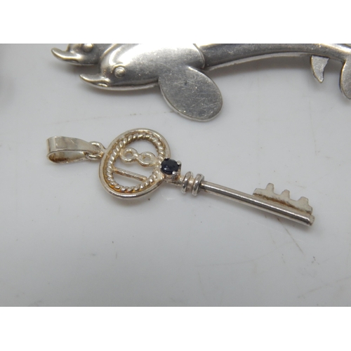 163 - A Quantity of Silver & Silver Gilt Brooches, Locket & Key Pendant together with a White Metal Cameo ... 