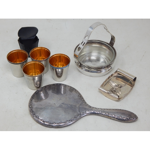 Silver Dressing Table Mirror Hallmarked Birmingham 1930 by William Atkins together with a WMF Secessionist Swing Handled Basket with Clear Glass Liner, A Set of Four Gold Washed Stirrup Cups in Morocco Leather Case & a Pin Dish with Dragonfly Decoration