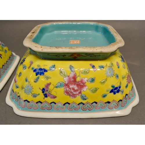 7 - A Pair of 19th Century Chinese Pedestal Dishes of square form, each decorated in polychrome enamels ... 