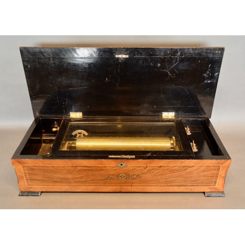 370 - A 19th Century Swiss Musical Box playing ten airs, the rosewood crossbanded case inlaid with musical... 