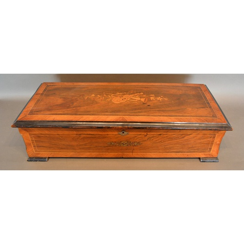 370 - A 19th Century Swiss Musical Box playing ten airs, the rosewood crossbanded case inlaid with musical... 