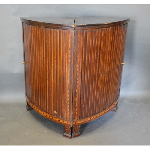 576 - A Pair of 19th Century Mahogany and Marquetry Inlaid Corner Cabinets, each with a ribbed panel door ... 