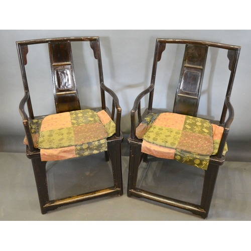 578 - A Pair of 19th Century Chinese Hardwood Armchairs, each with a carved back above a panel seat, raise... 