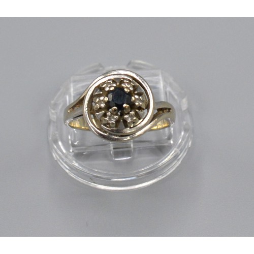 173 - A 14ct White Gold Sapphire and Diamond Cluster Ring with central sapphire surrounded by diamonds in ... 