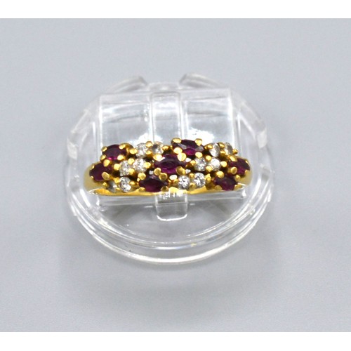177 - A 18ct Yellow Gold Diamond and Ruby Ring set with three rows of rubies interspersed with diamonds, S... 