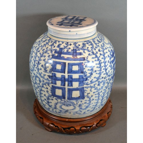 9 - A 19th Century Chinese Large Covered Ginger Jar decorated in underglaze blue with pierced hardwood s... 