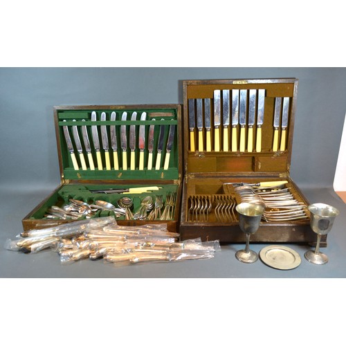 156 - A Silver Plated Canteen of Cutlery housed within an oak cabinet together with another similar and va... 